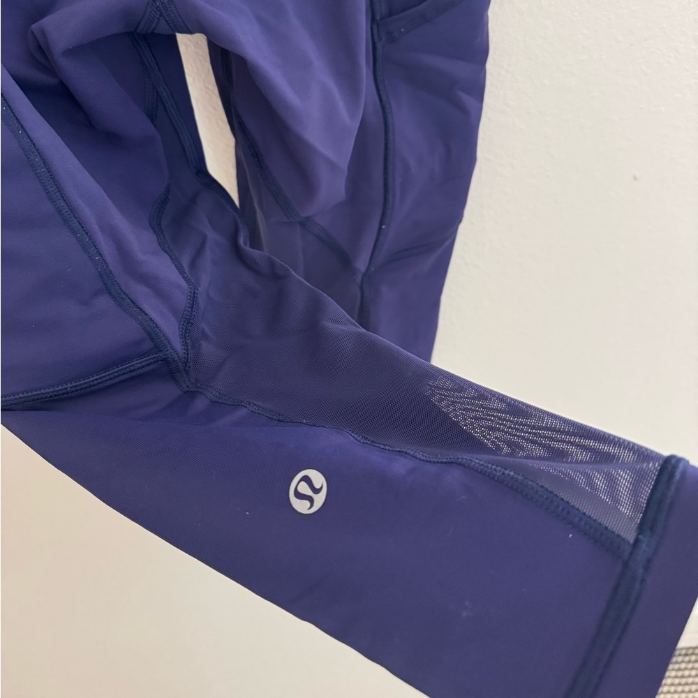 Women’s Lululemon purple capri leggings, Size 4